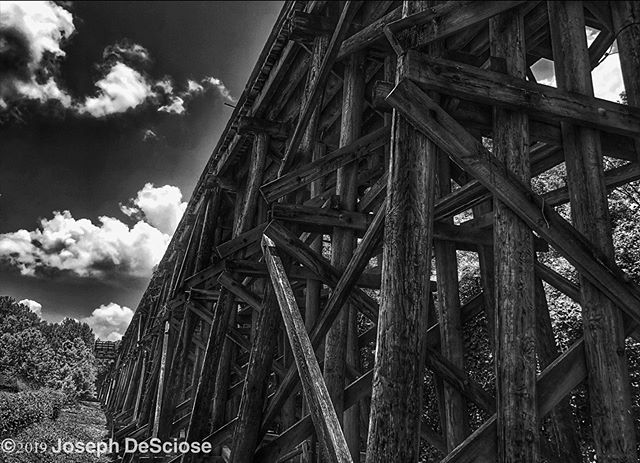 Railroad trestle #commercialphotography #fineartphotography #alabama #wooden #engineering #structure #architecture #clouds #vanishingpoint #geometric #icon #tuscaloosa