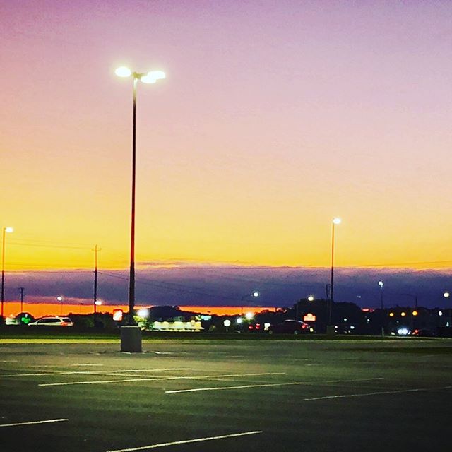Parking lot at sunset #landscape #fineartphotography #sunset #horizon #emptiness #lonely #cars #parkinglot